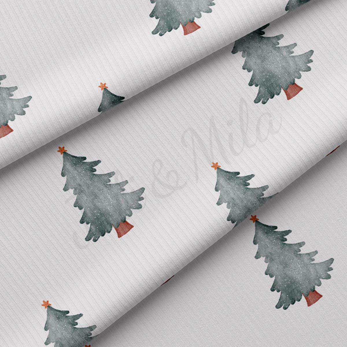 a white background with a watercolor christmas tree on it