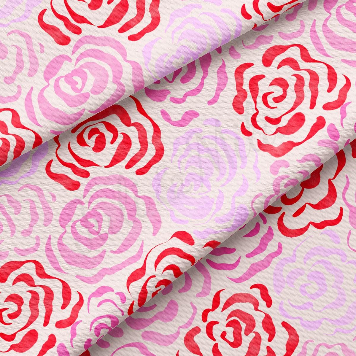 a pink and red rose print fabric