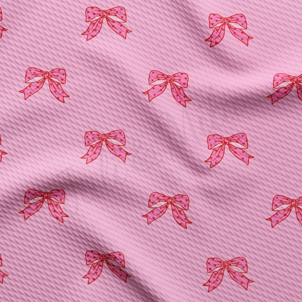 a pink background with pink bows on it