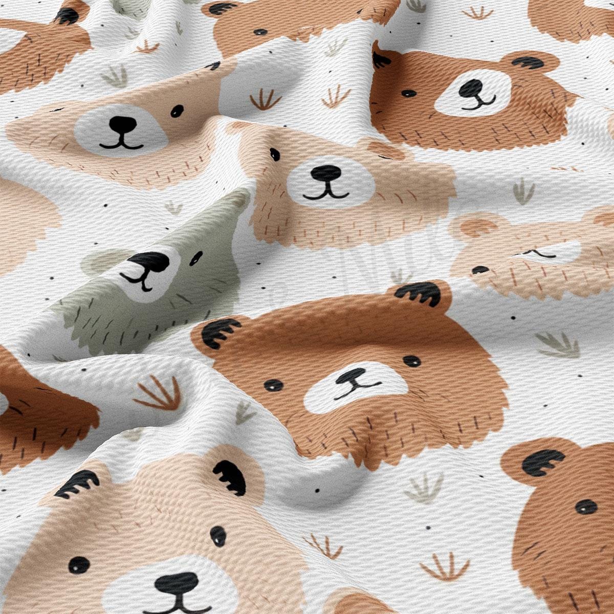 a close up of a bear pattern on a sheet