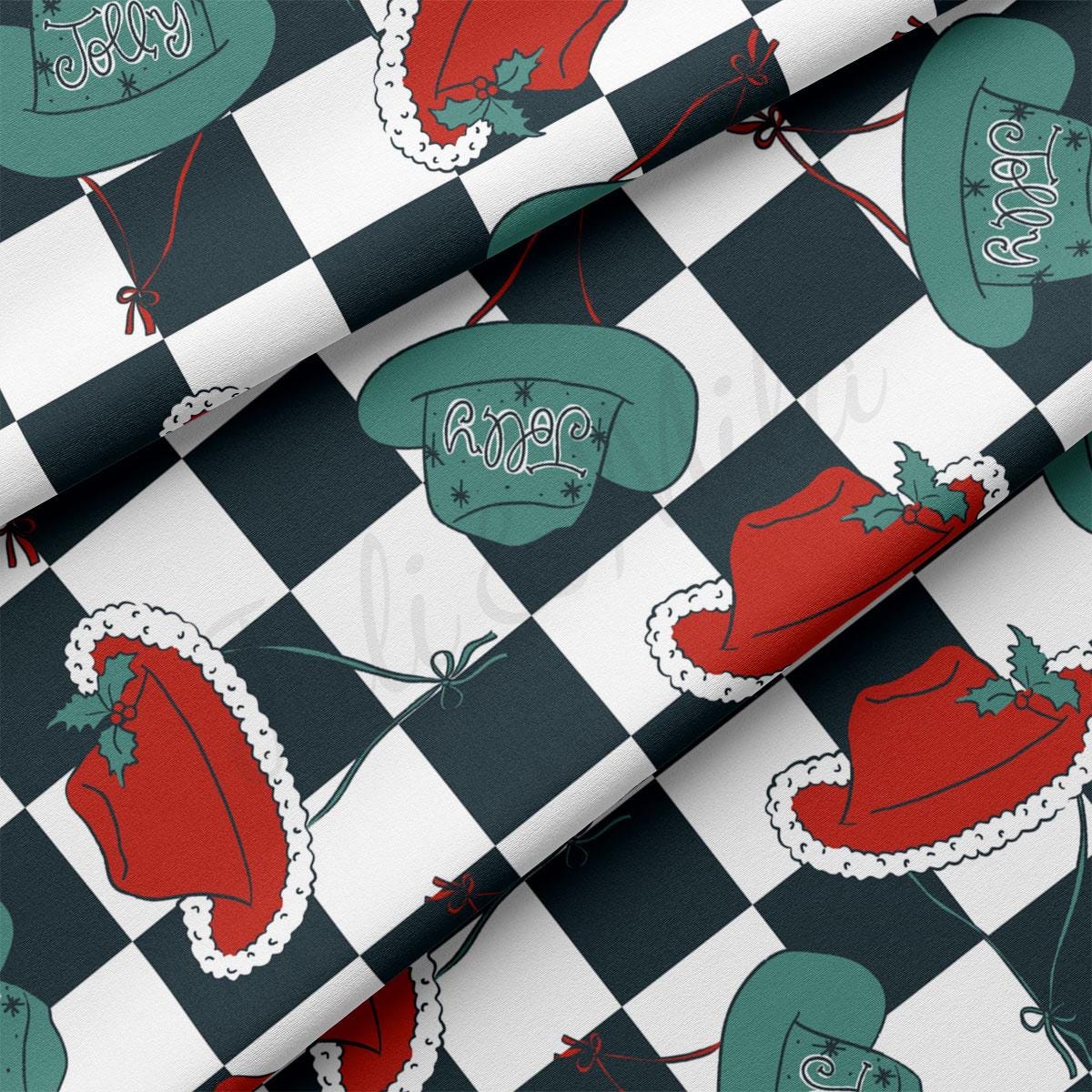 a black and white checkered fabric with santa hats on it