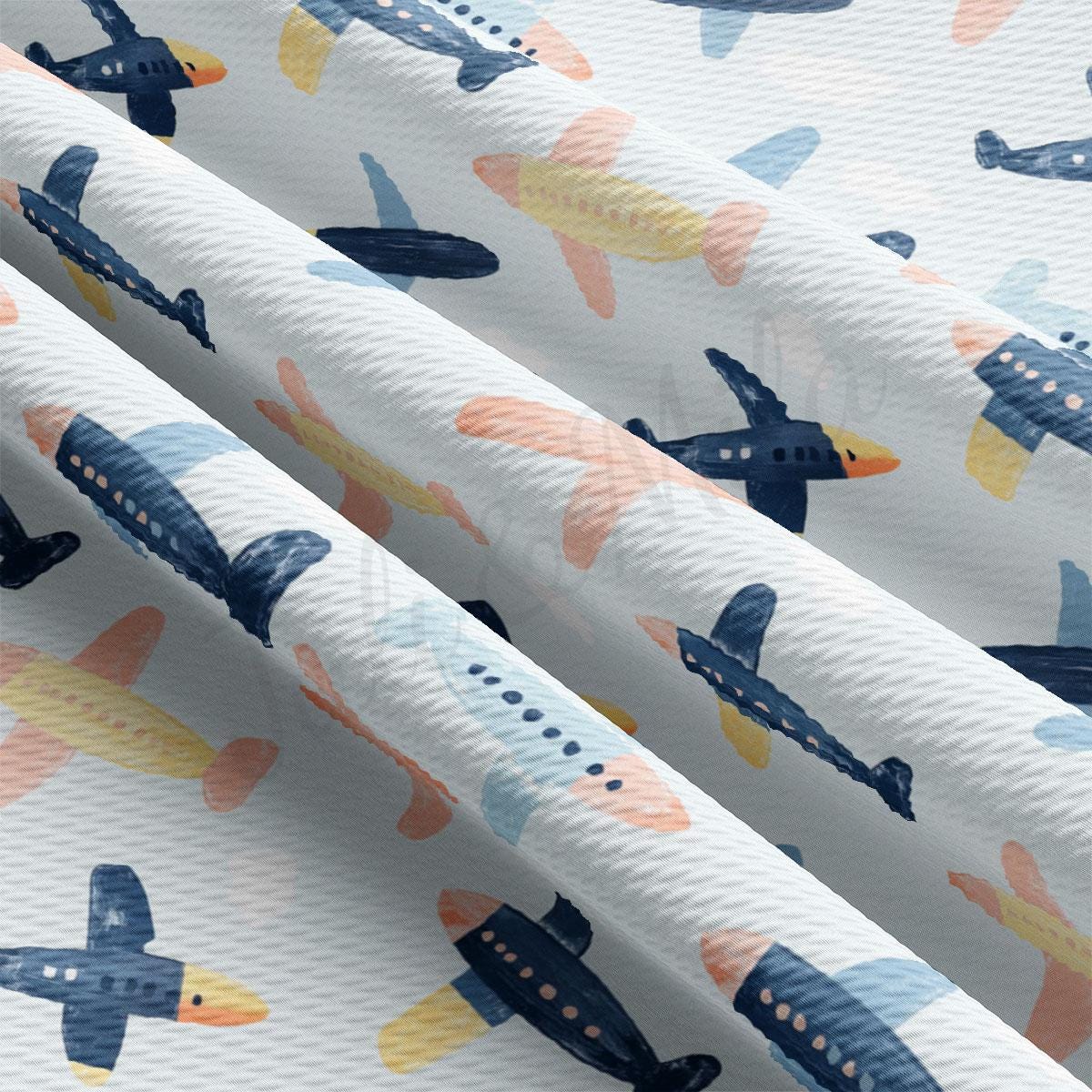 a close up of a pattern of airplanes