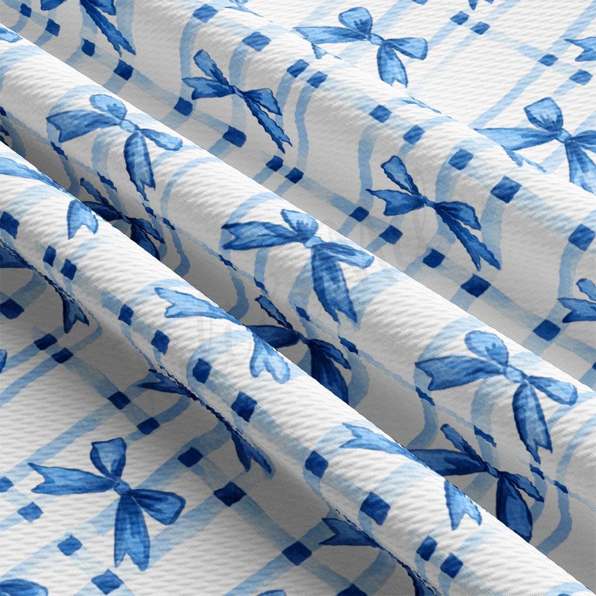 a close up of a blue and white wallpaper