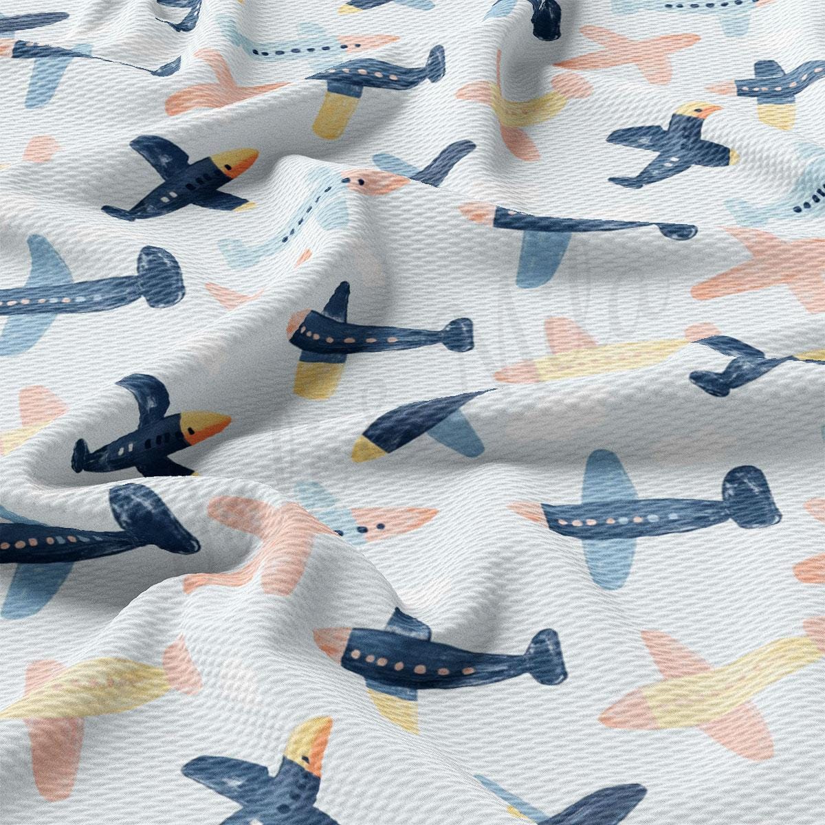 a close up of a fabric with airplanes on it