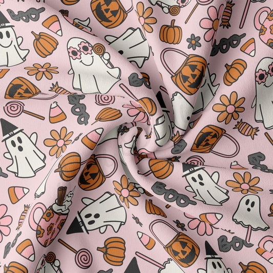 a pink background with a pattern of ghost and pumpkins