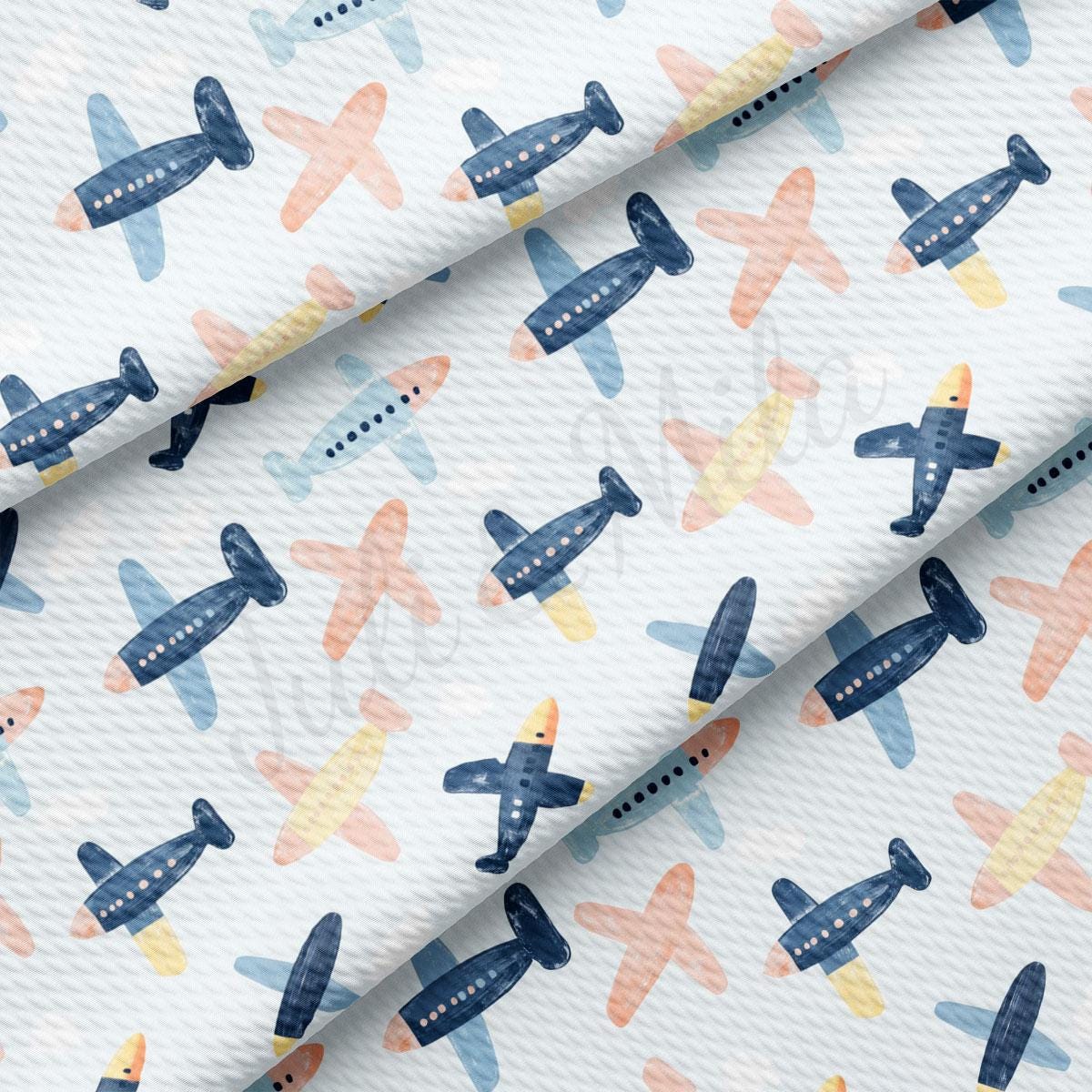 a pattern of small airplanes on a white background