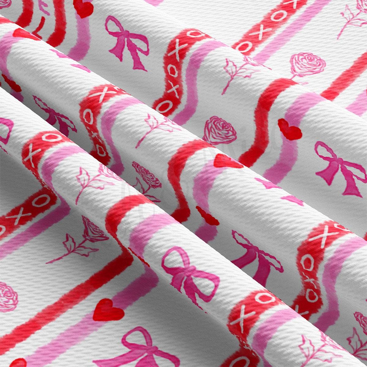 a close up of a pink and white wrapping paper