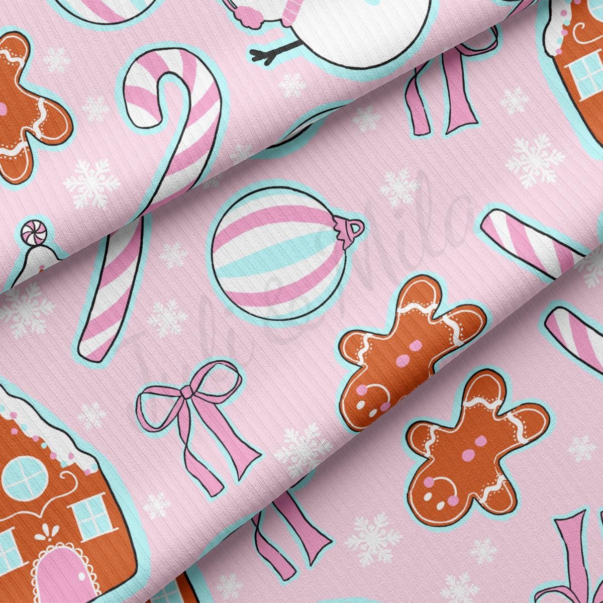 a pink background with gingerbreads and candy canes