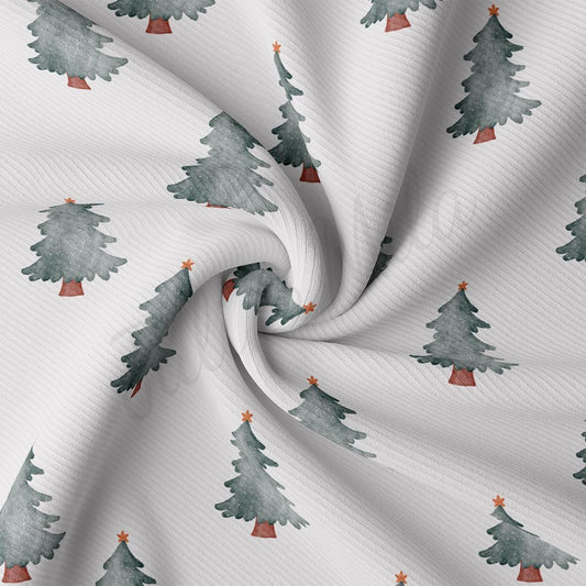 a white fabric with trees on it