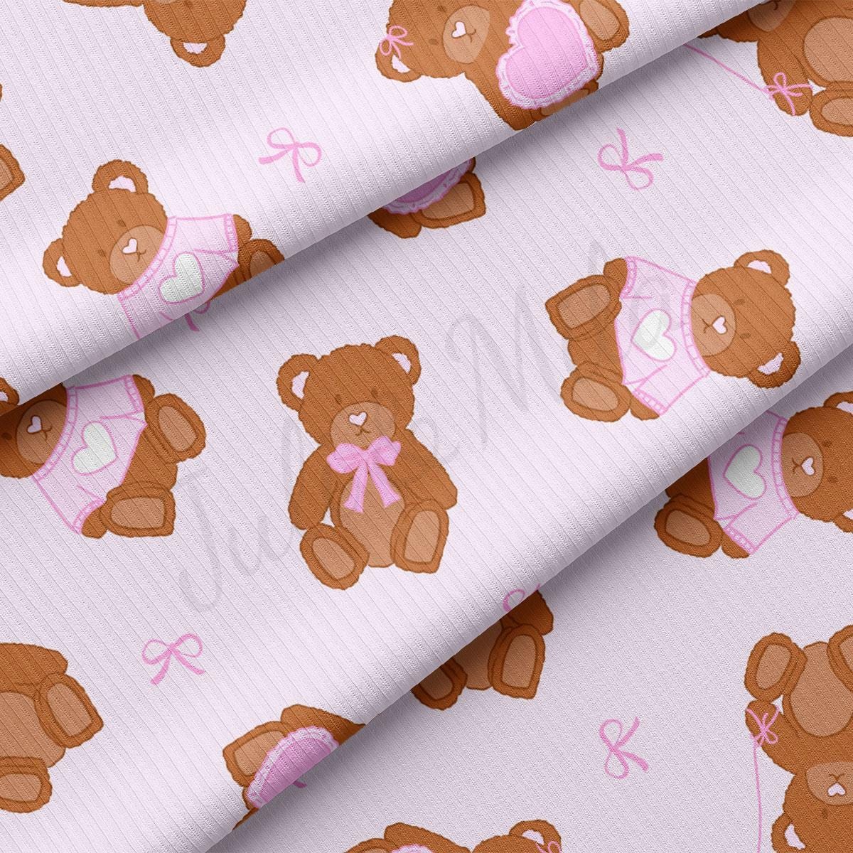 a brown teddy bear on a pink background