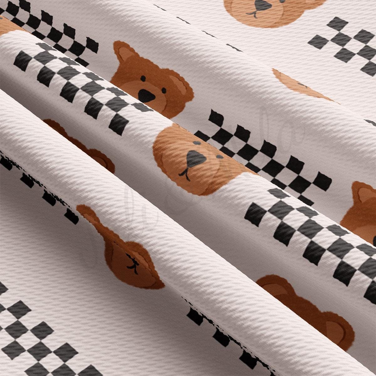 a close up of a teddy bear on a checkered background