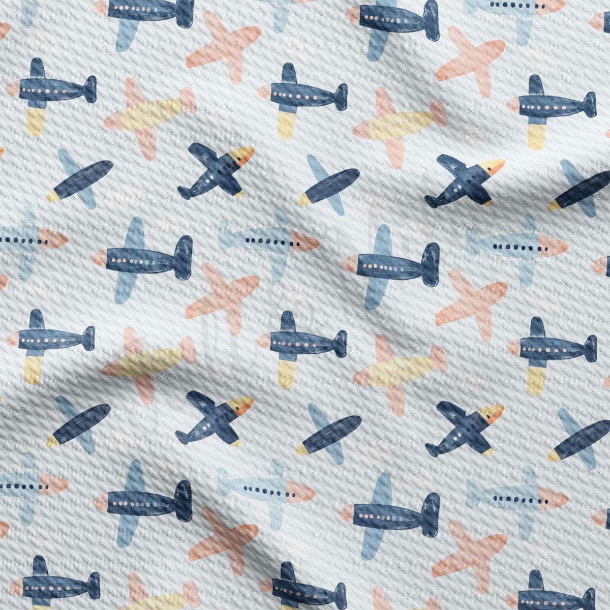 a pattern of small airplanes on a white background