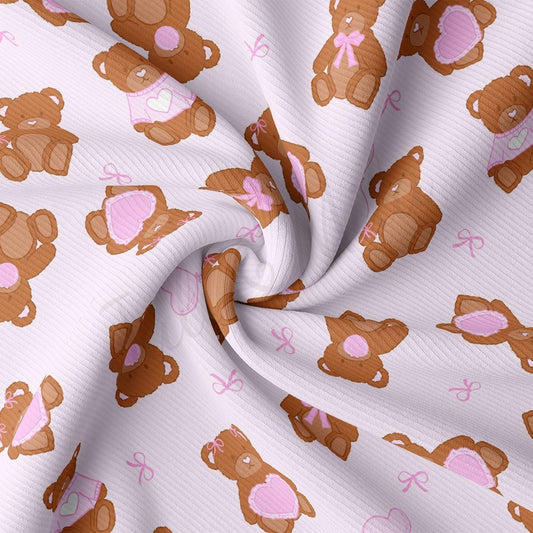 a pink and brown teddy bear pattern on a white background