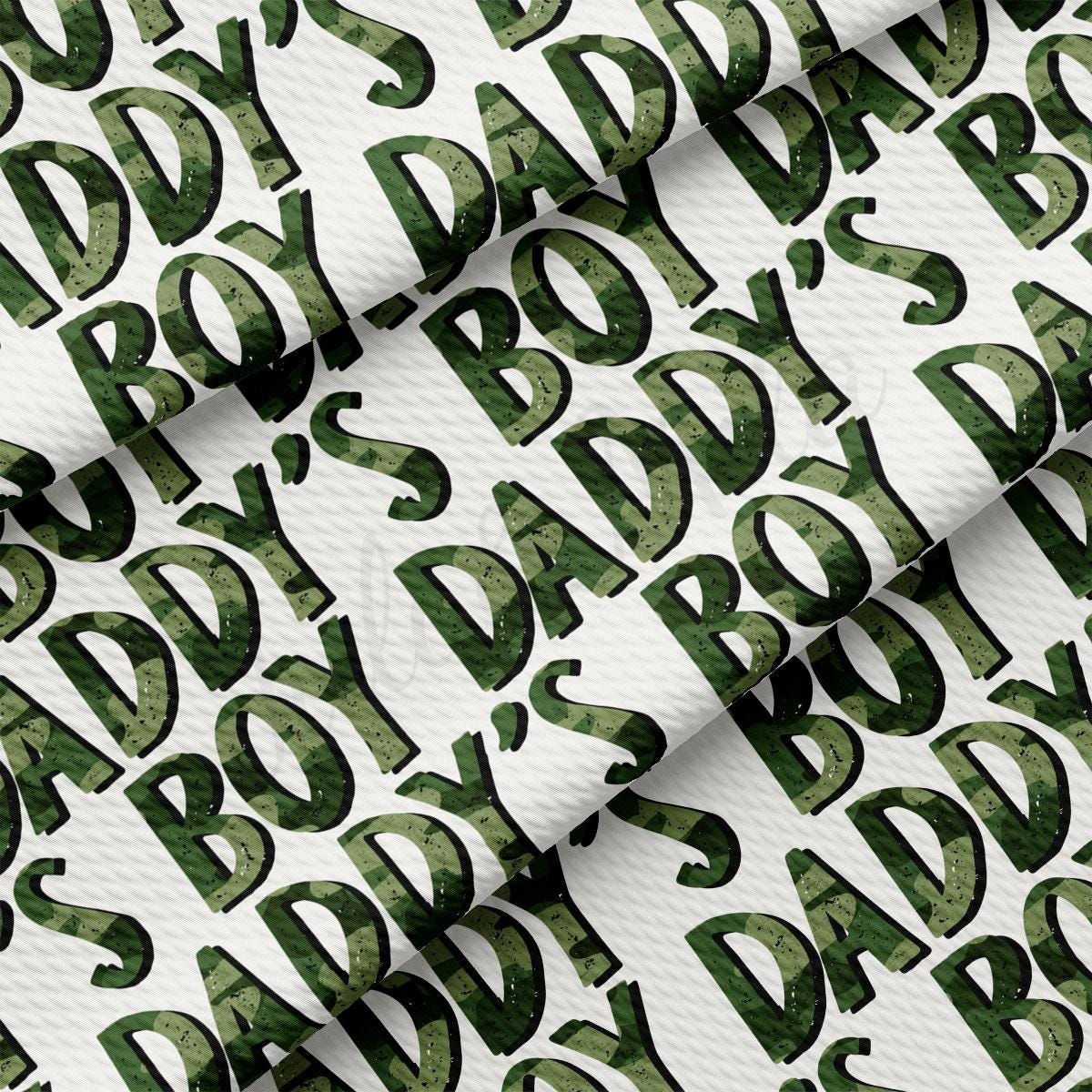 a pattern of green letters on white paper