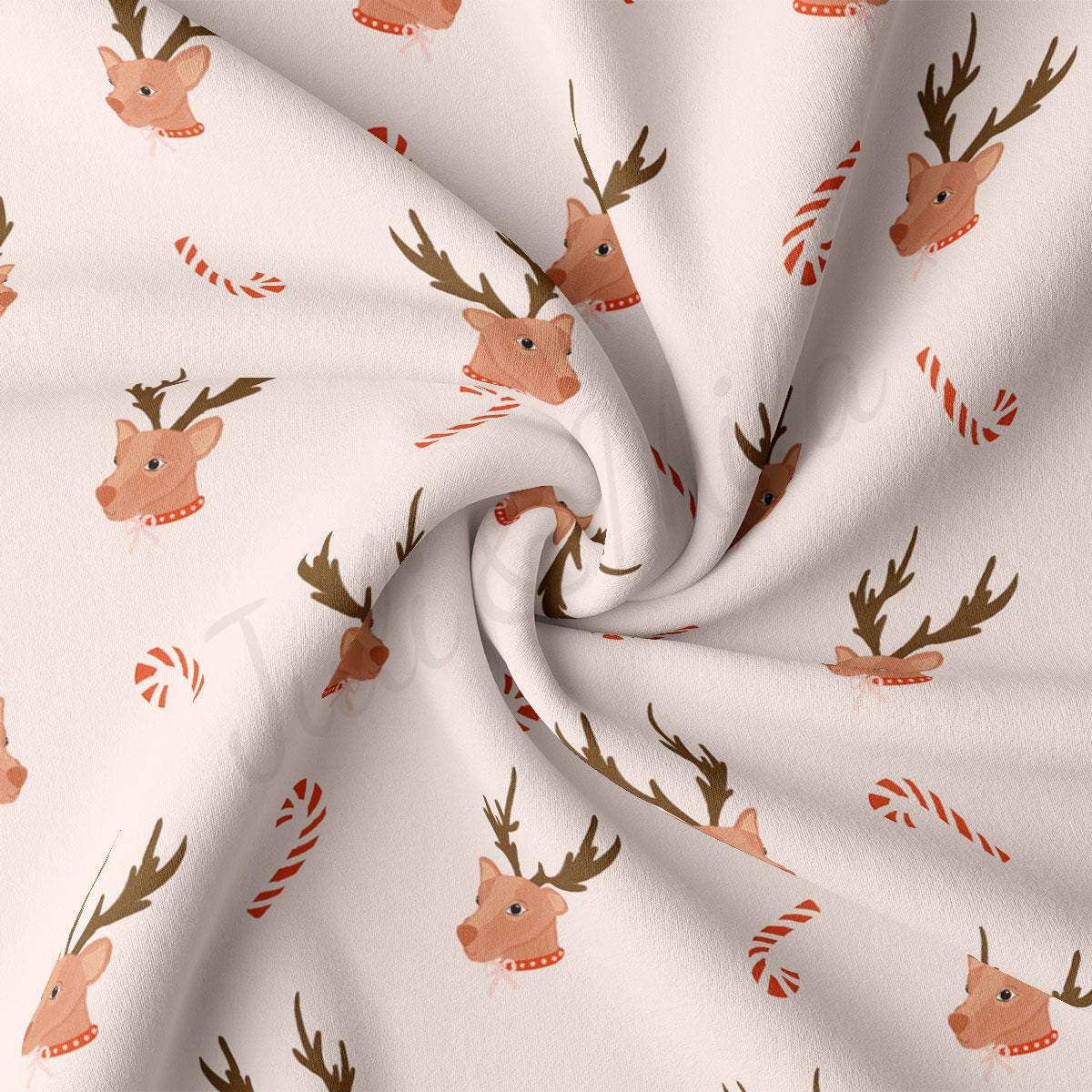 a white fabric with reindeer heads and candy canes on it