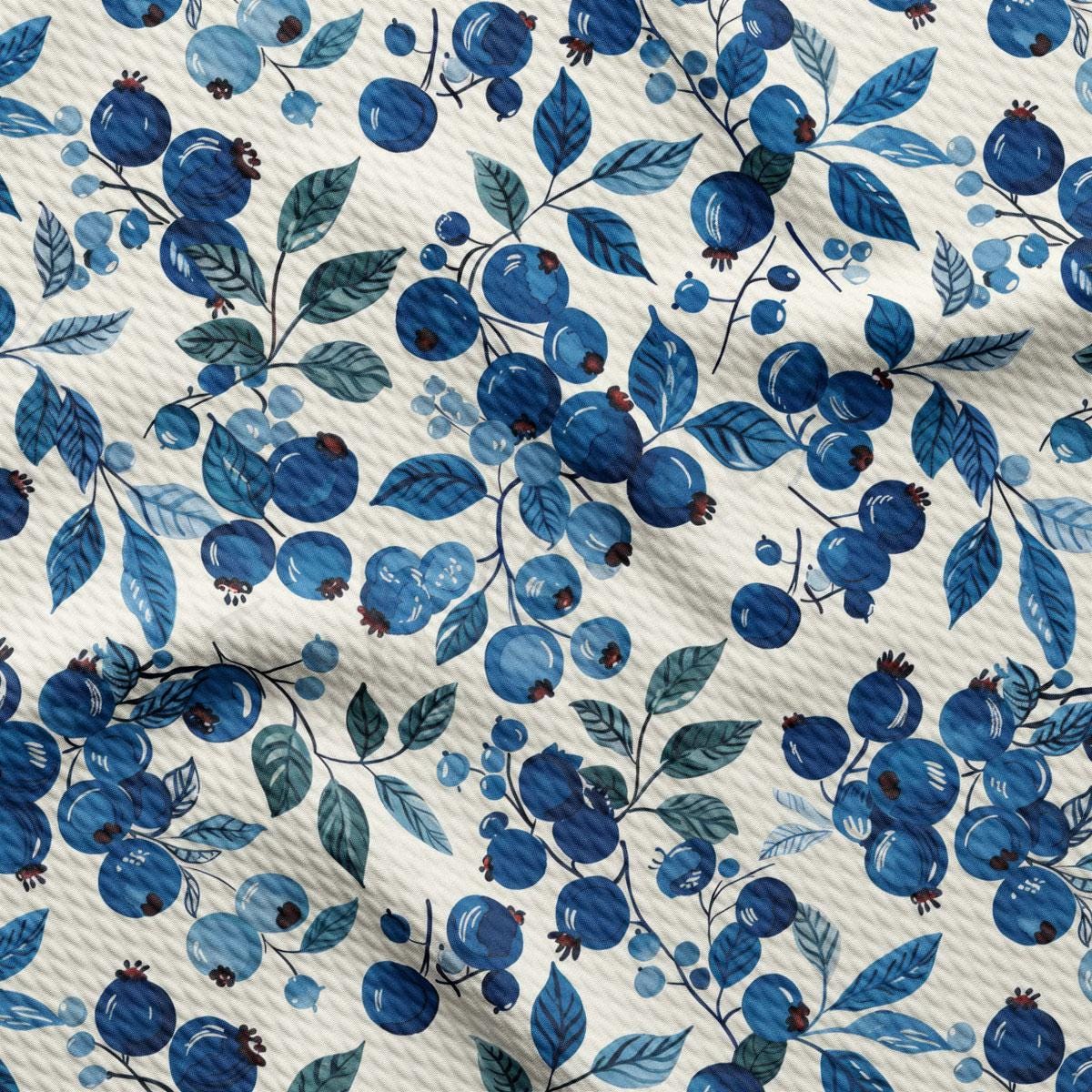 a blue and white floral print on a white background