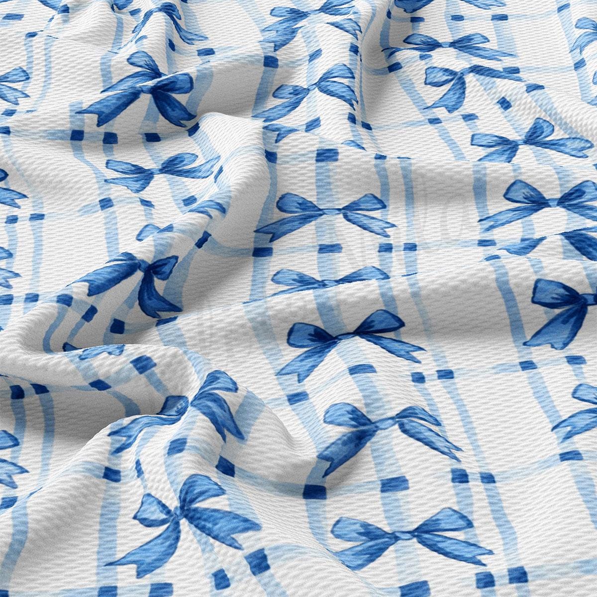 a close up of a blue and white fabric