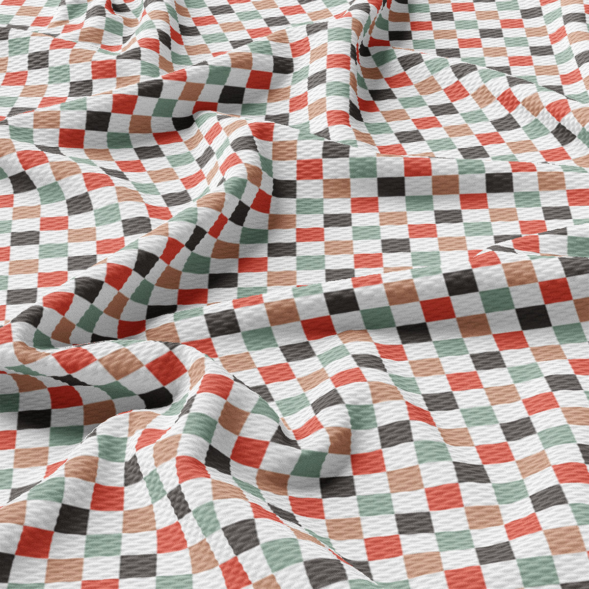 a checkered table cloth with a red, white, and green checkered pattern