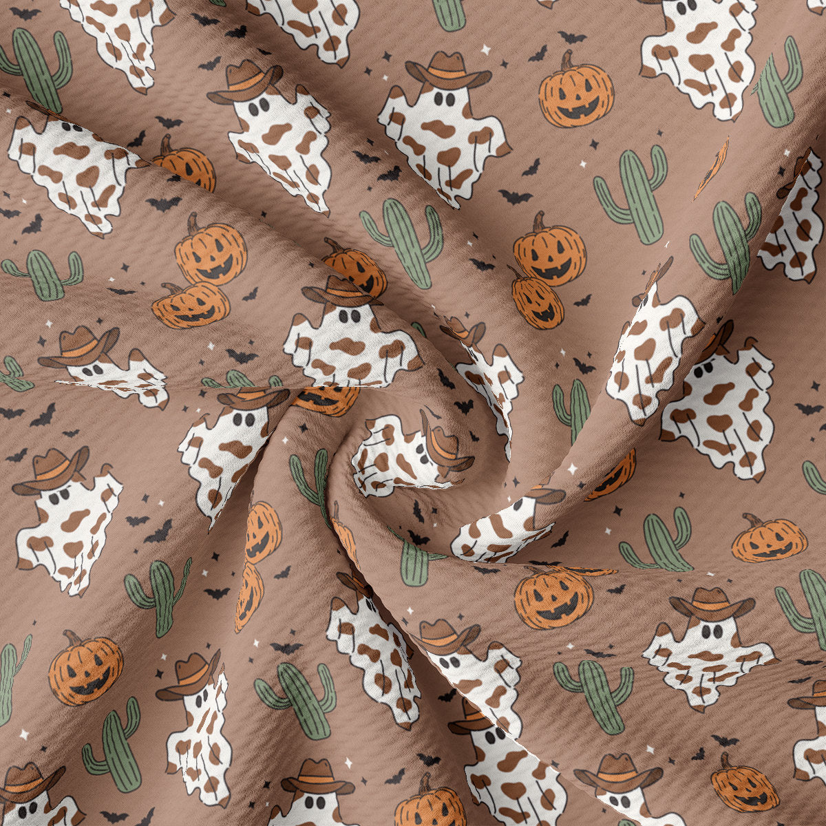 a cow and pumpkin pattern on a brown background