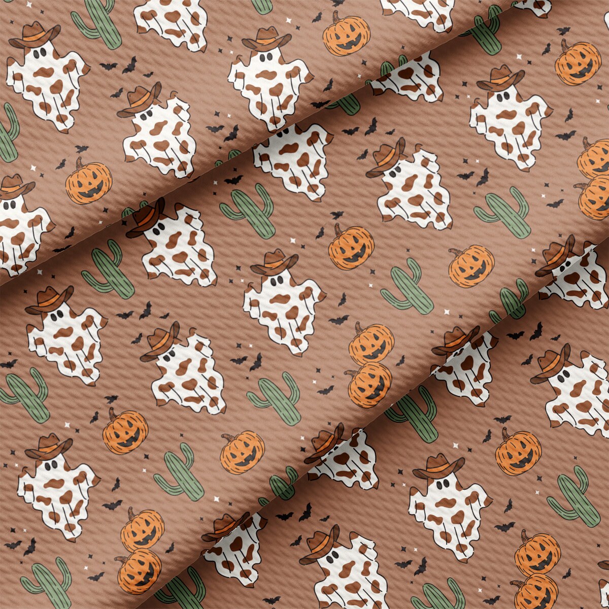 a close up of a tie with a cow pattern on it