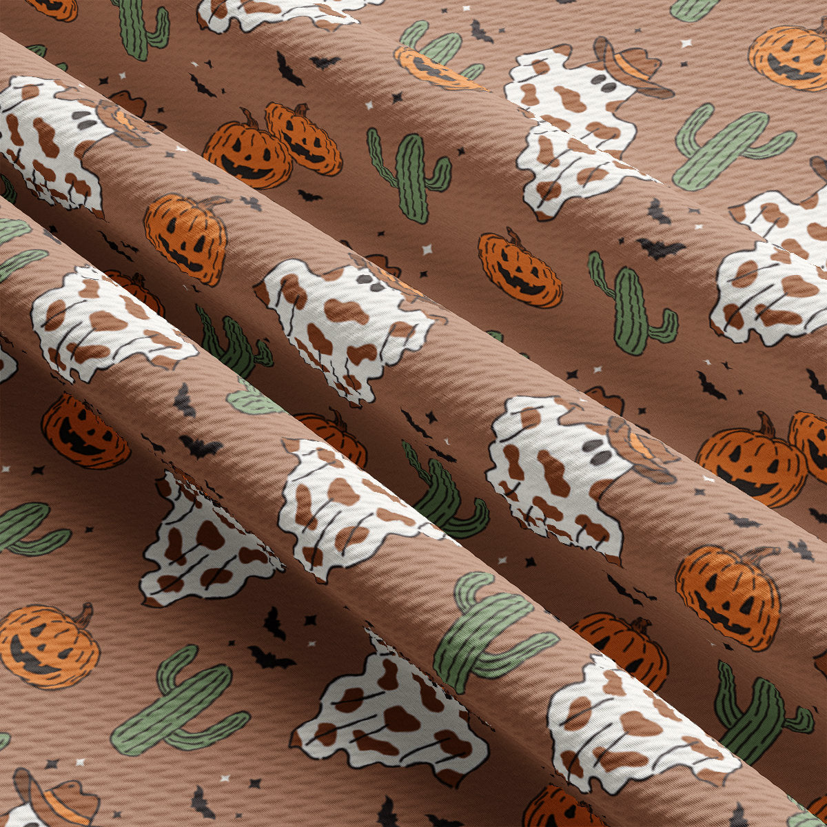 a pattern of pumpkins and cows on a brown background