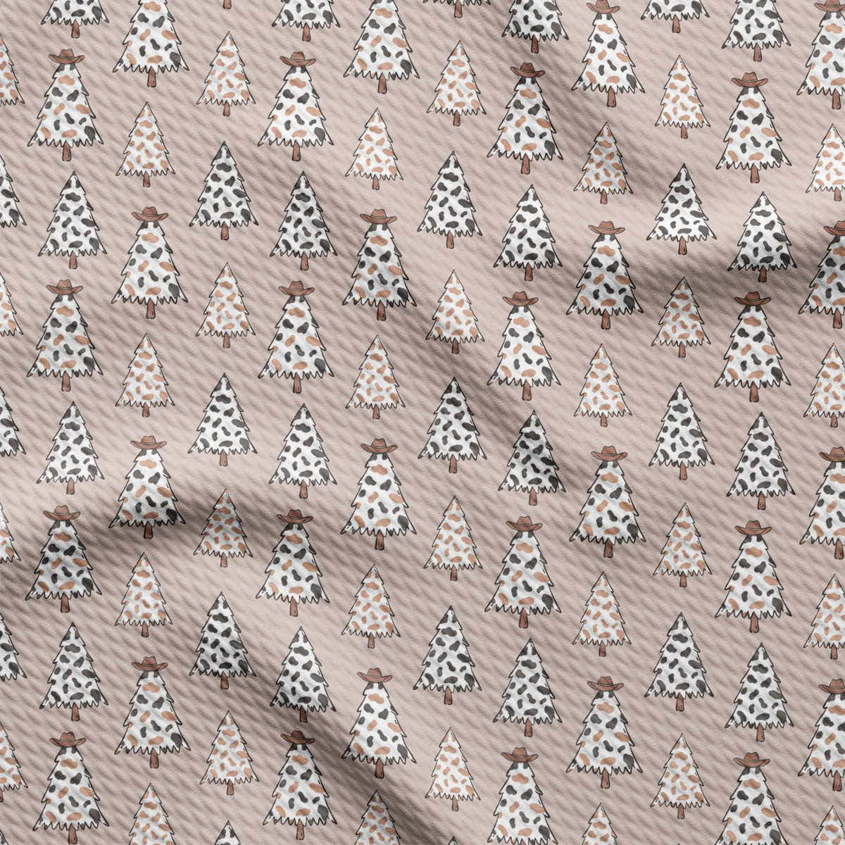 a pattern of christmas trees on a pink background