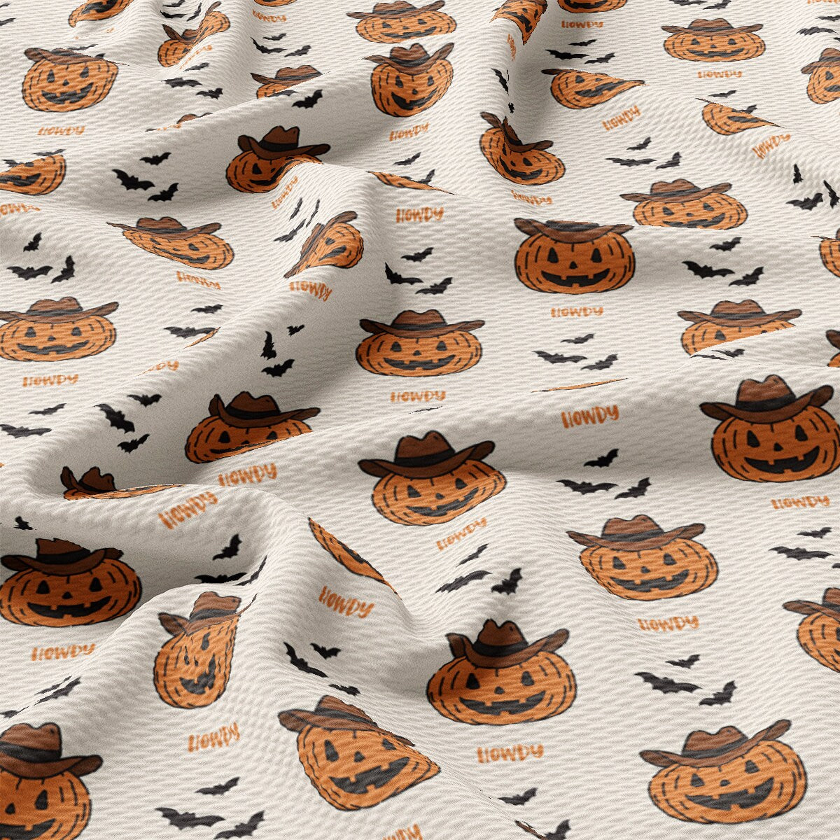 a pattern of pumpkins and bats on a white background