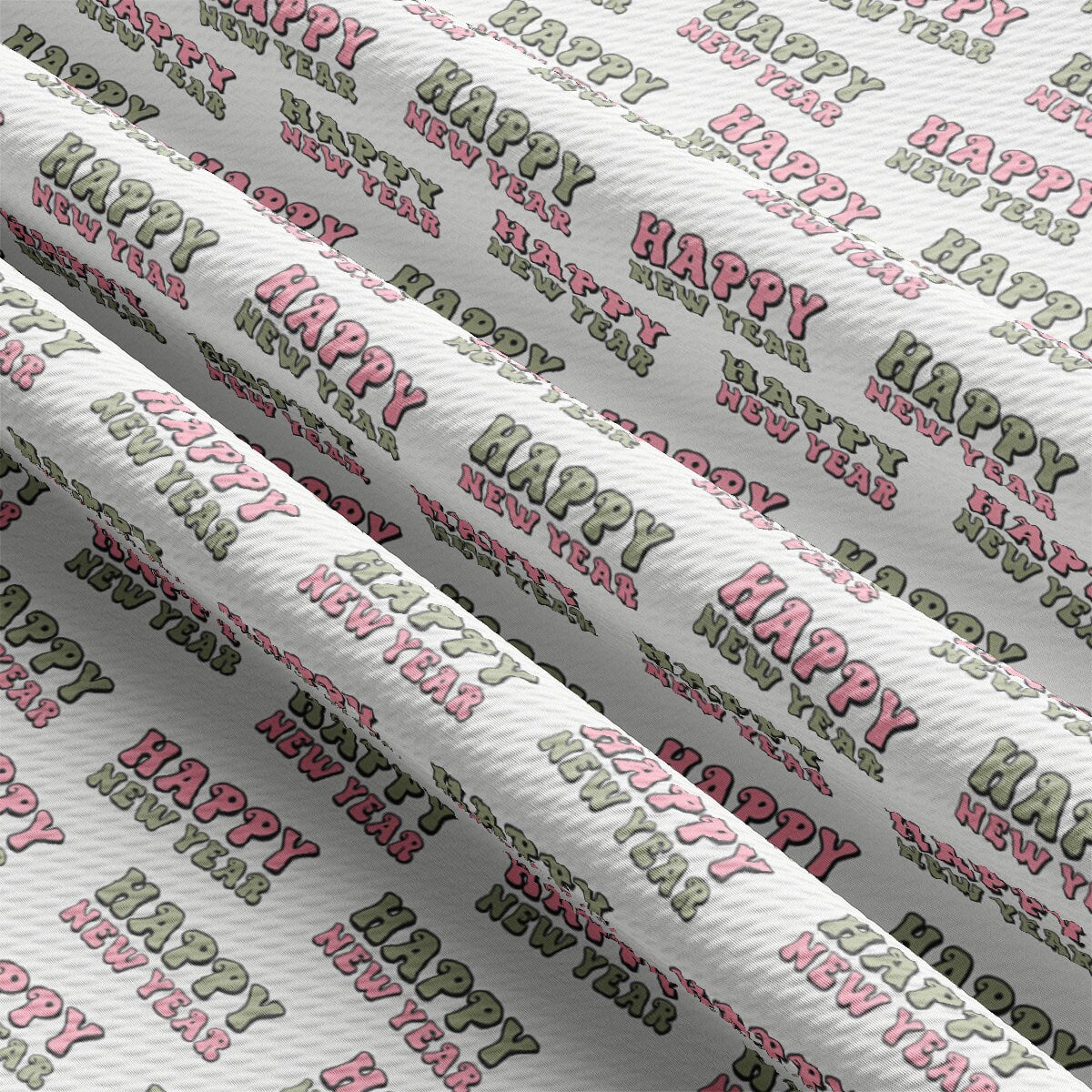 a white wrapping paper with pink and green letters