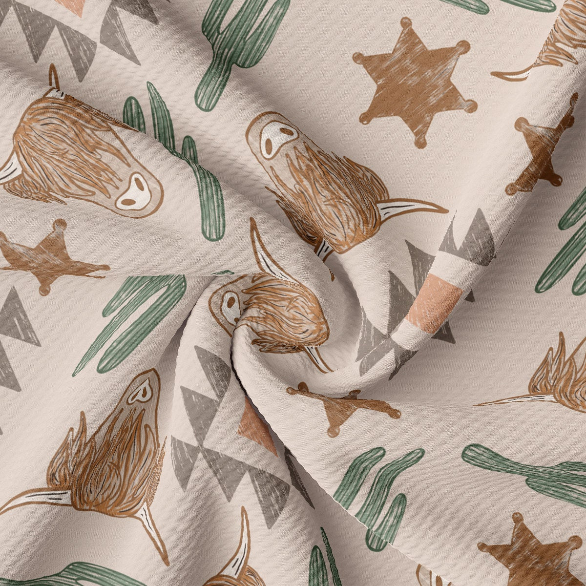 a close up of a fabric with animals on it