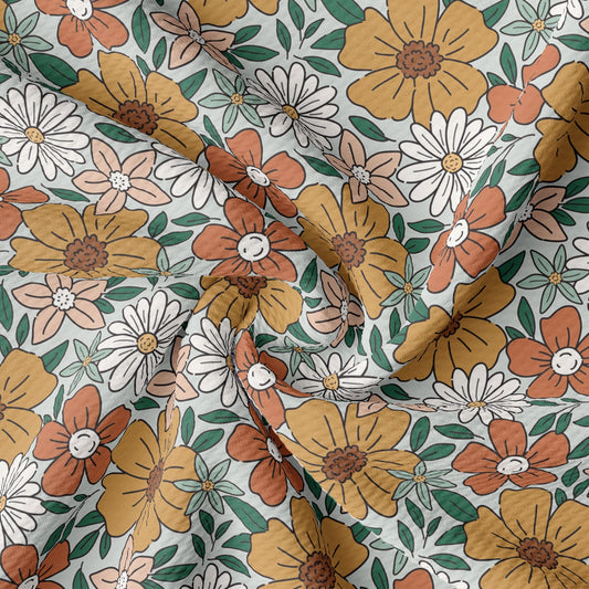 a close up of a fabric with flowers on it