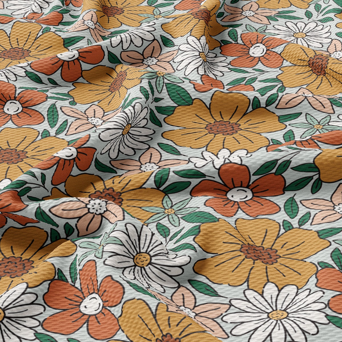 a close up of a flower pattern on a fabric