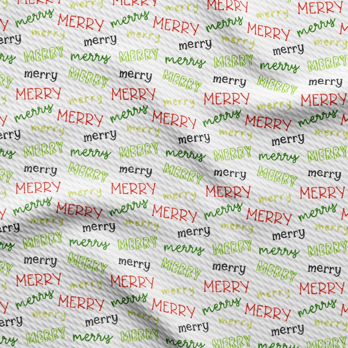 a christmas wrapping paper with merry lettering on it