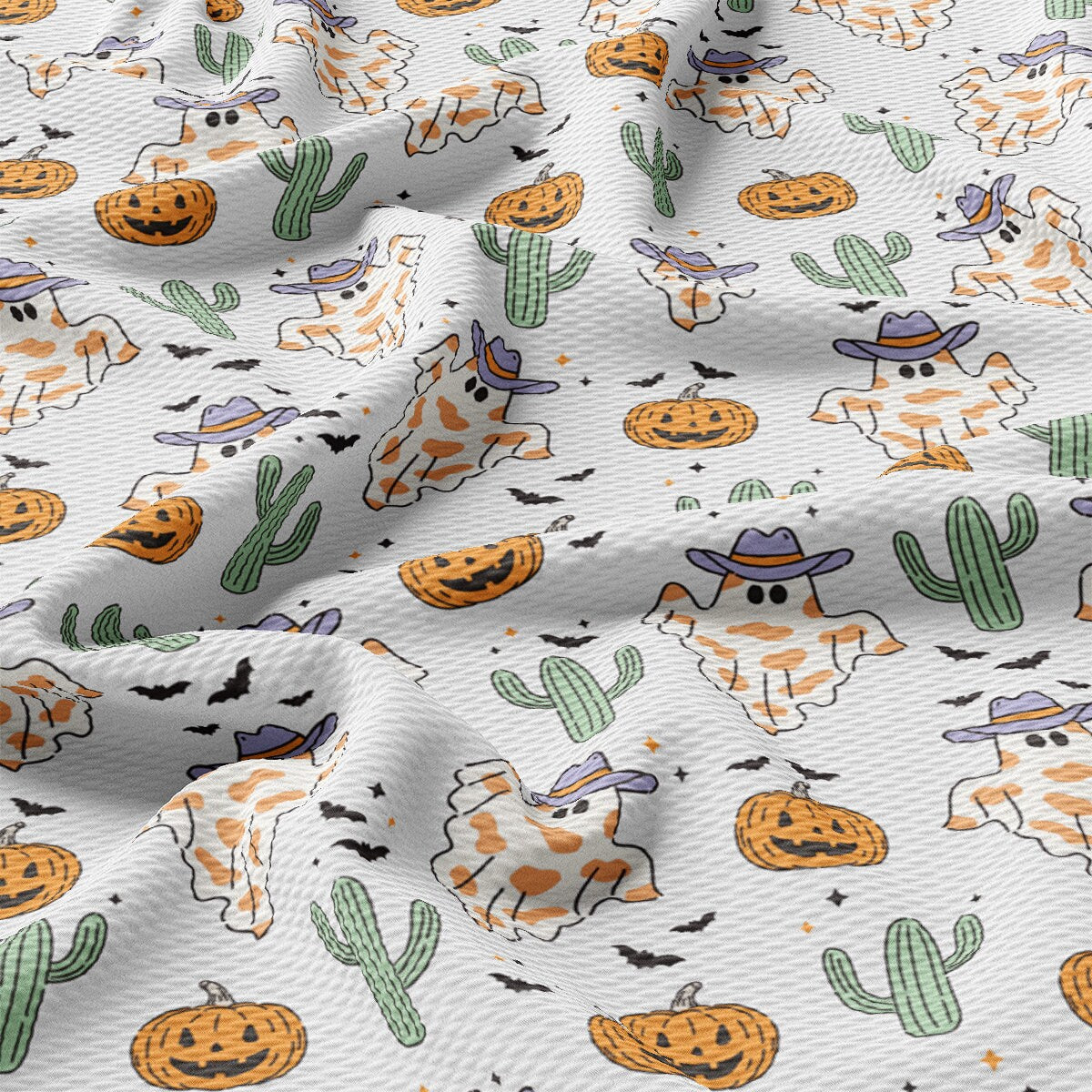 a white background with a pattern of pumpkins and cats