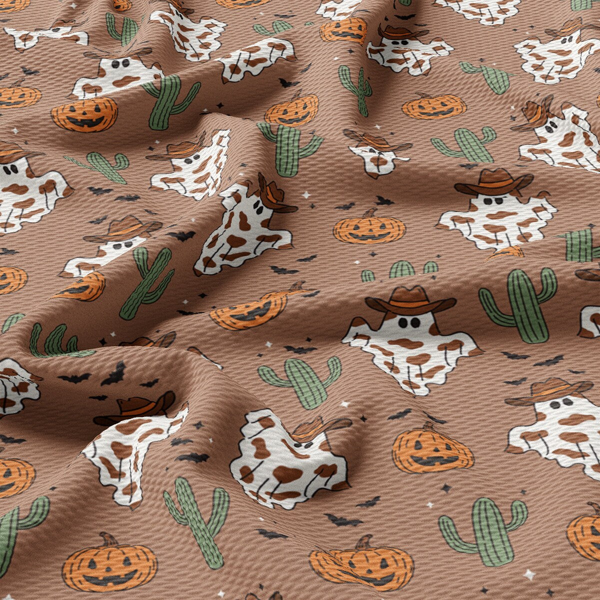 a pattern of cows and pumpkins on a brown background