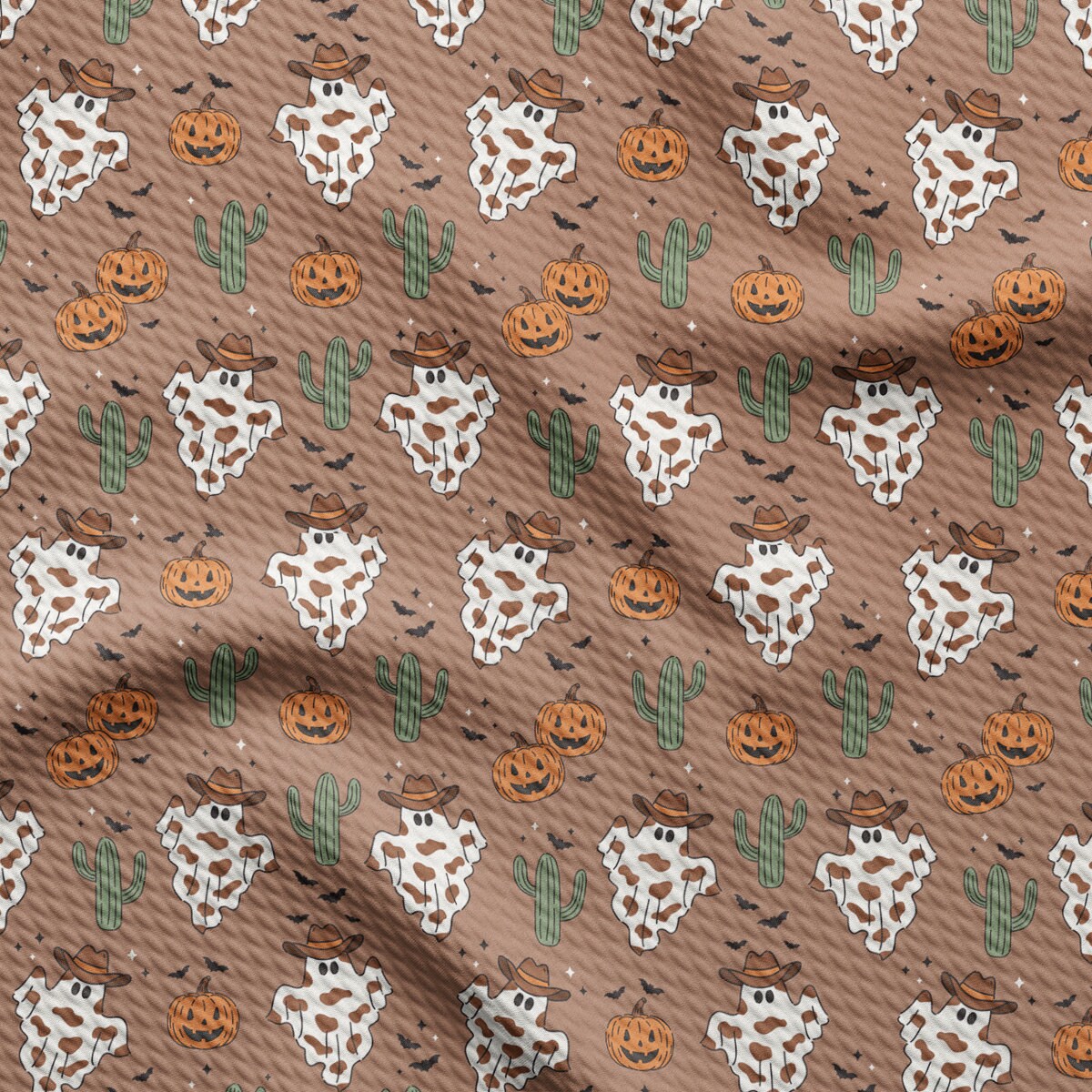 a pattern of cows and pumpkins on a brown background