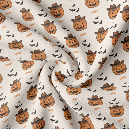 a pattern of pumpkins and bats on a white background