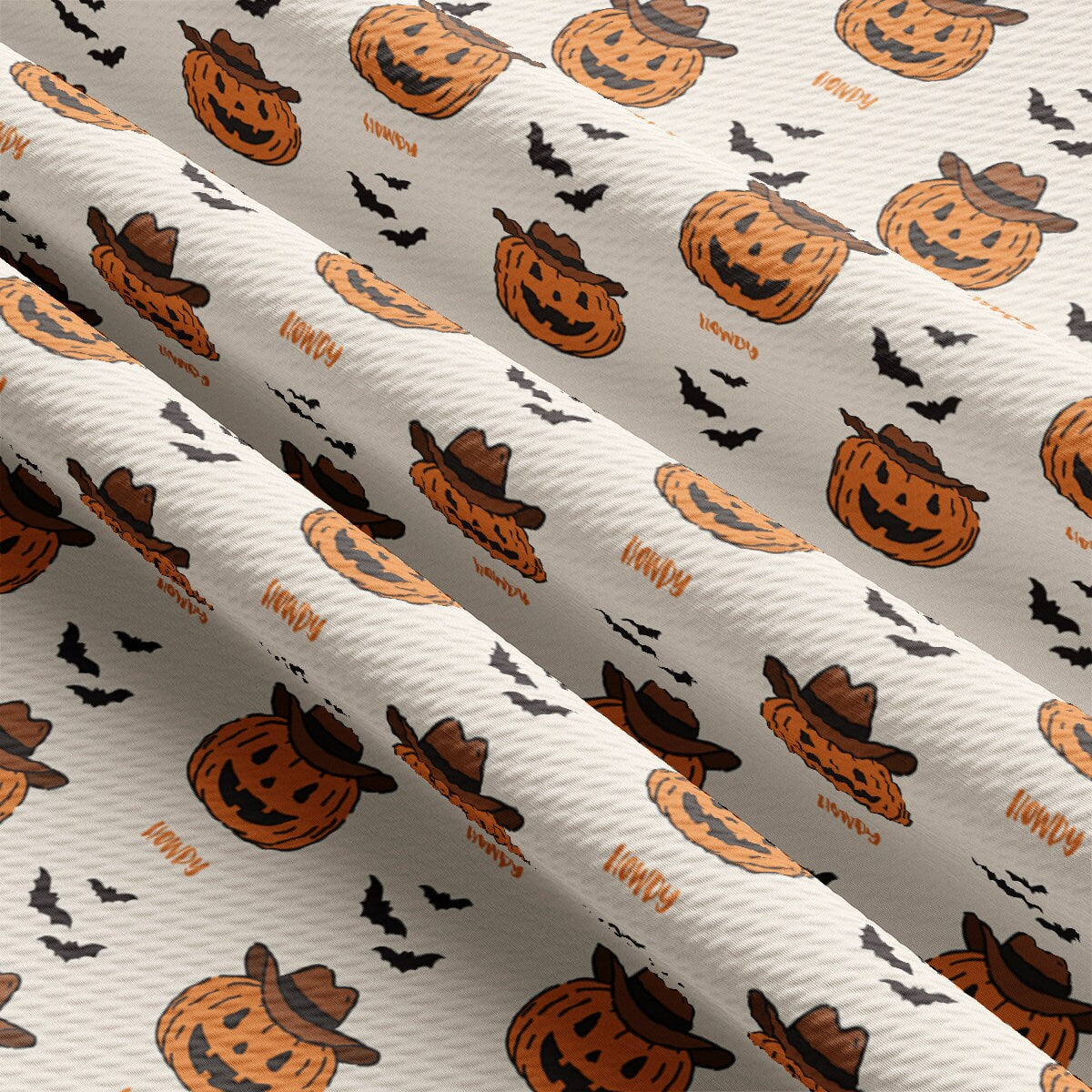 a pattern of pumpkins and bats on a white background