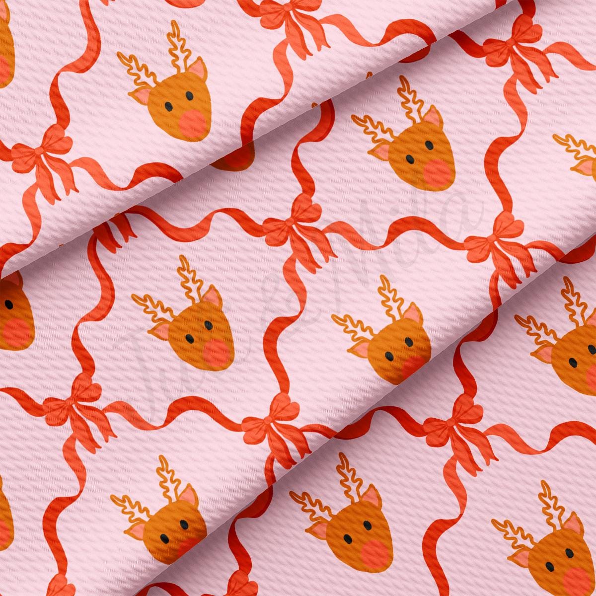 a close up of a pink background with orange deers on it