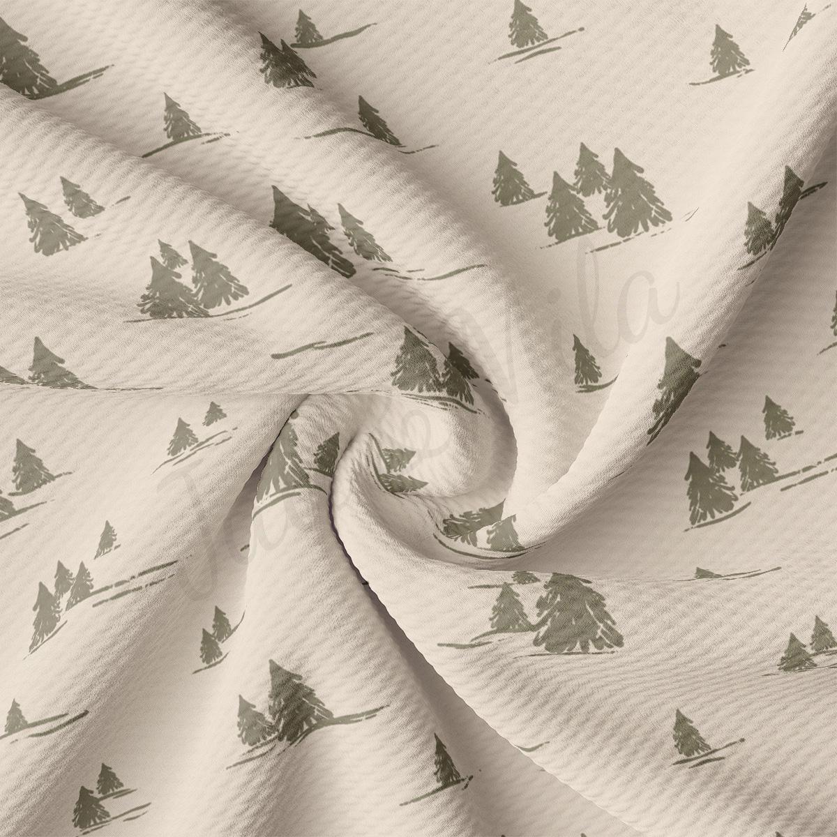 a white fabric with trees on it