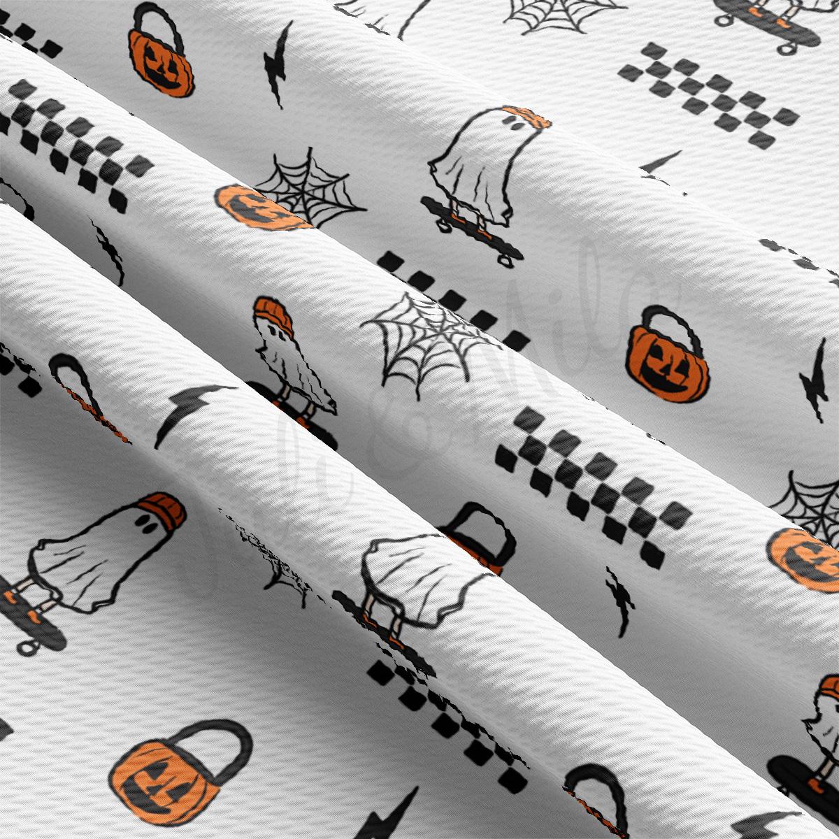 a pattern of halloween themed wrapping paper