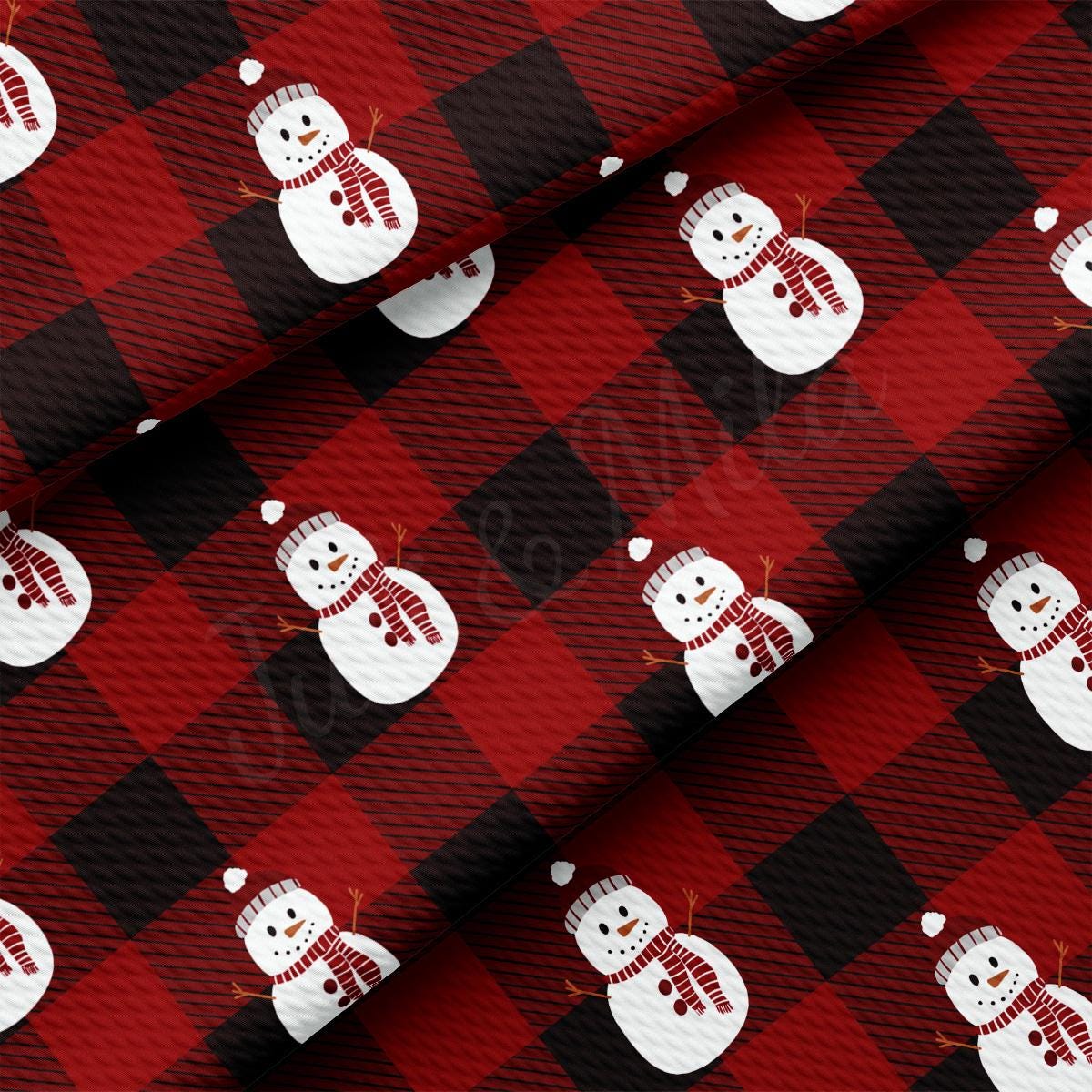 a red and black plaid pattern with a snowman on it