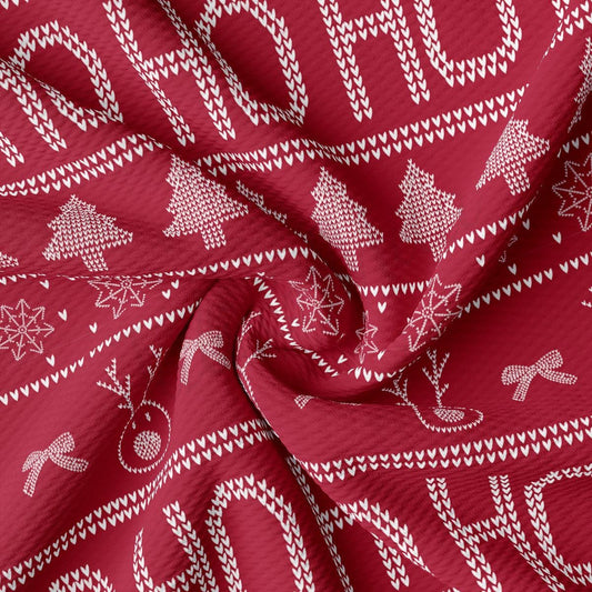 a close up of a red fabric with white snowflakes