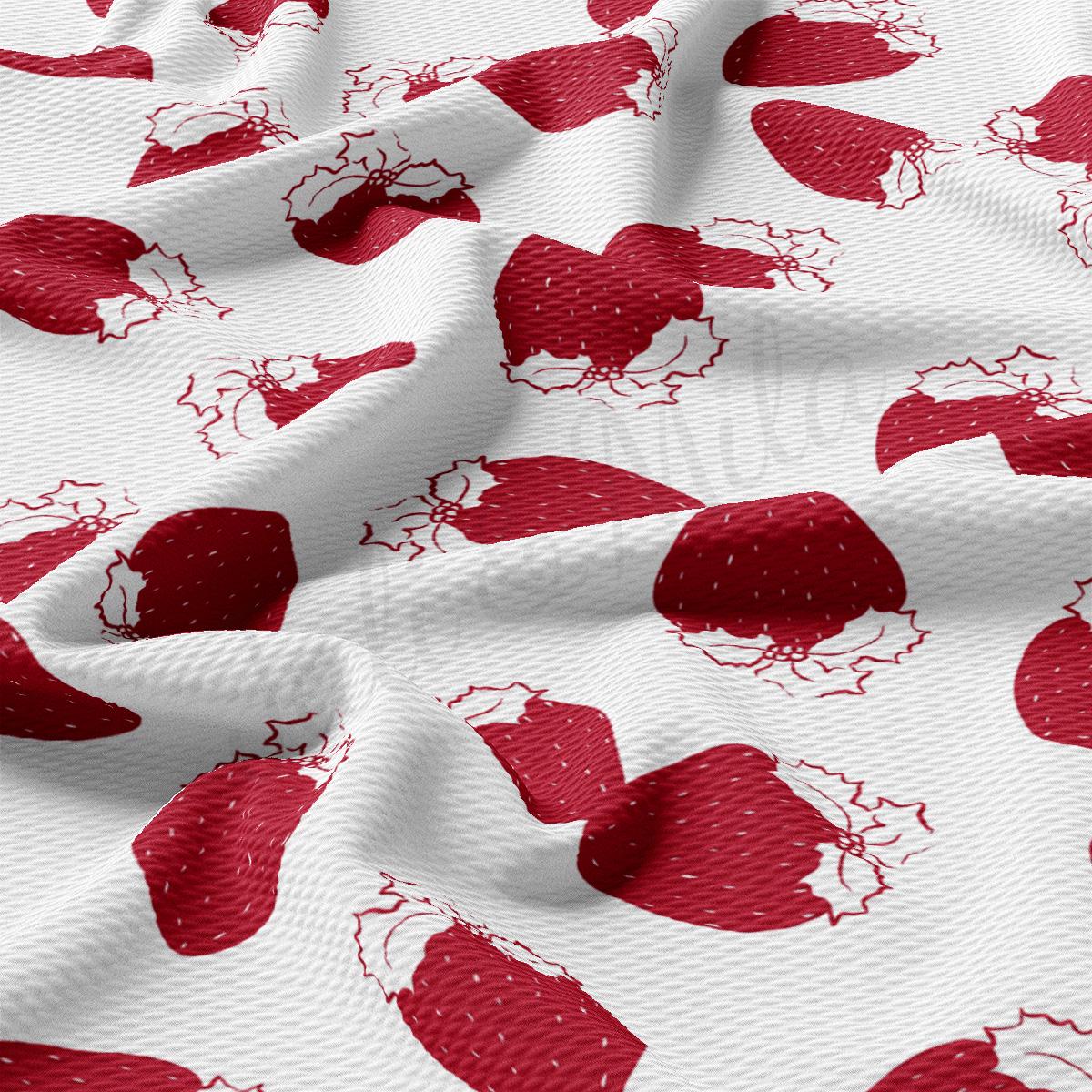 a close up of a red and white fabric