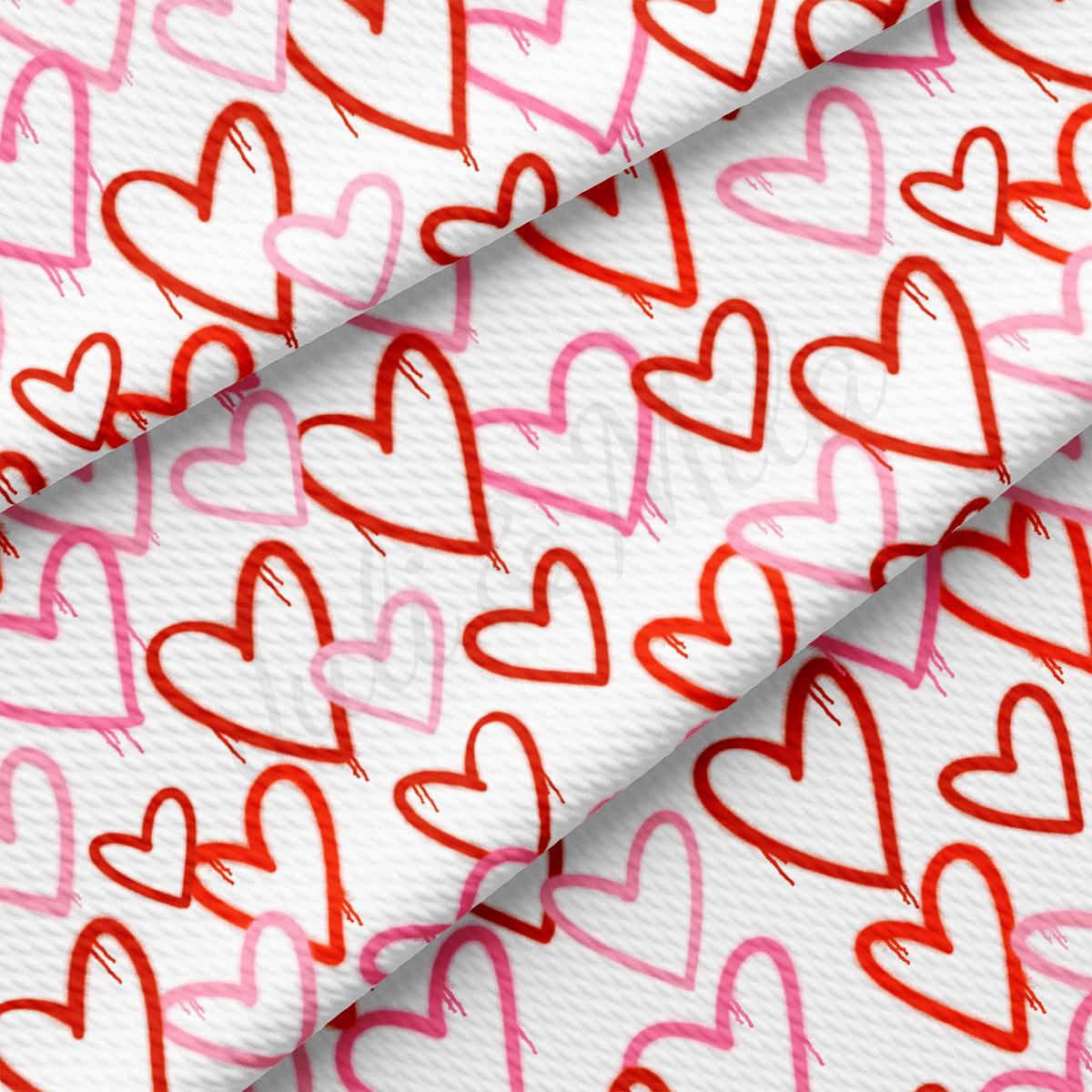 a white background with red and pink hearts on it