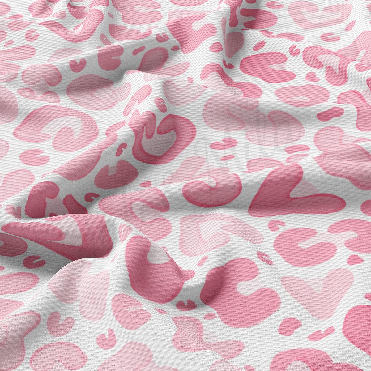 a pink and white animal print fabric