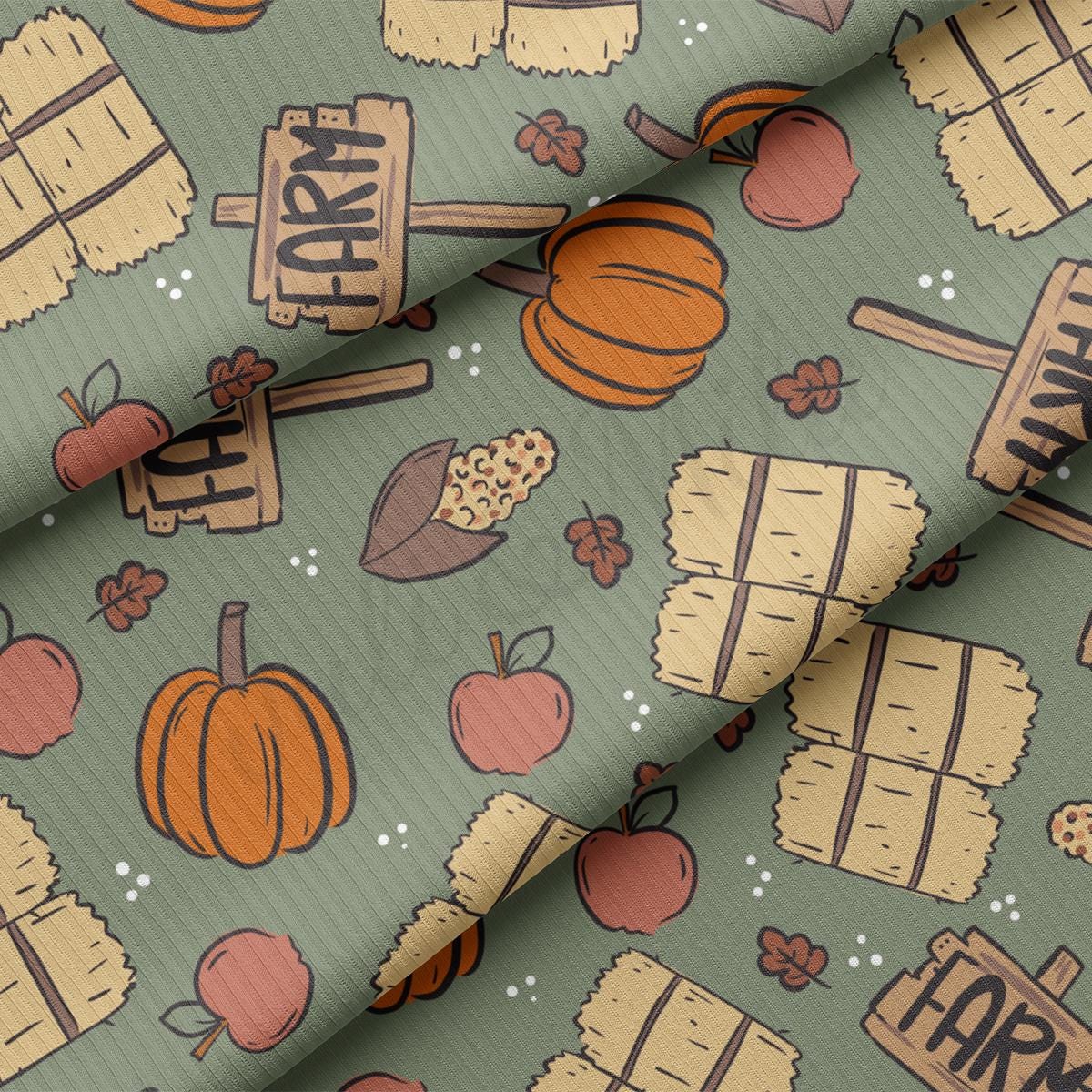 a close up of a green background with a pattern of pumpkins, apples,