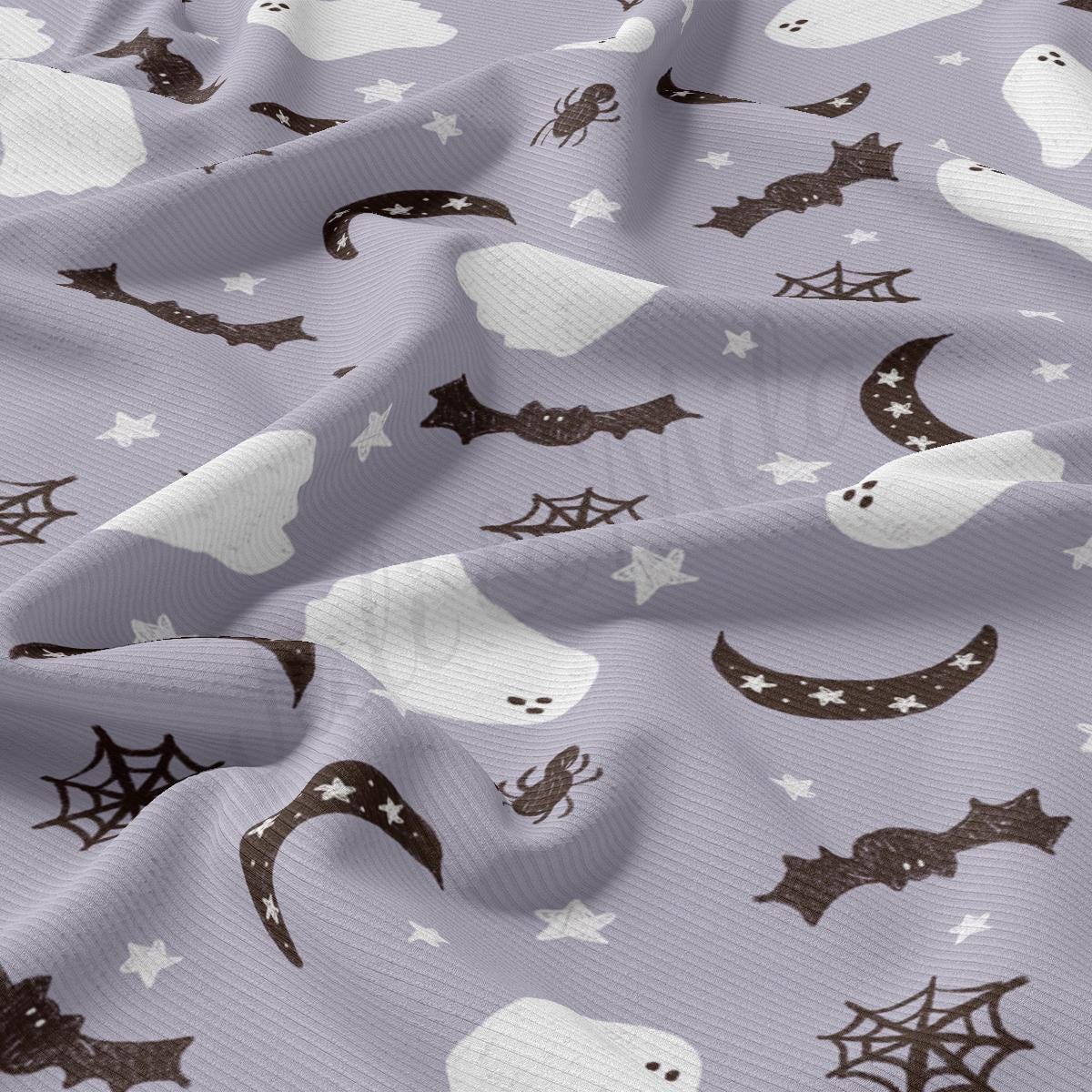 a close up of a pattern of bats and stars