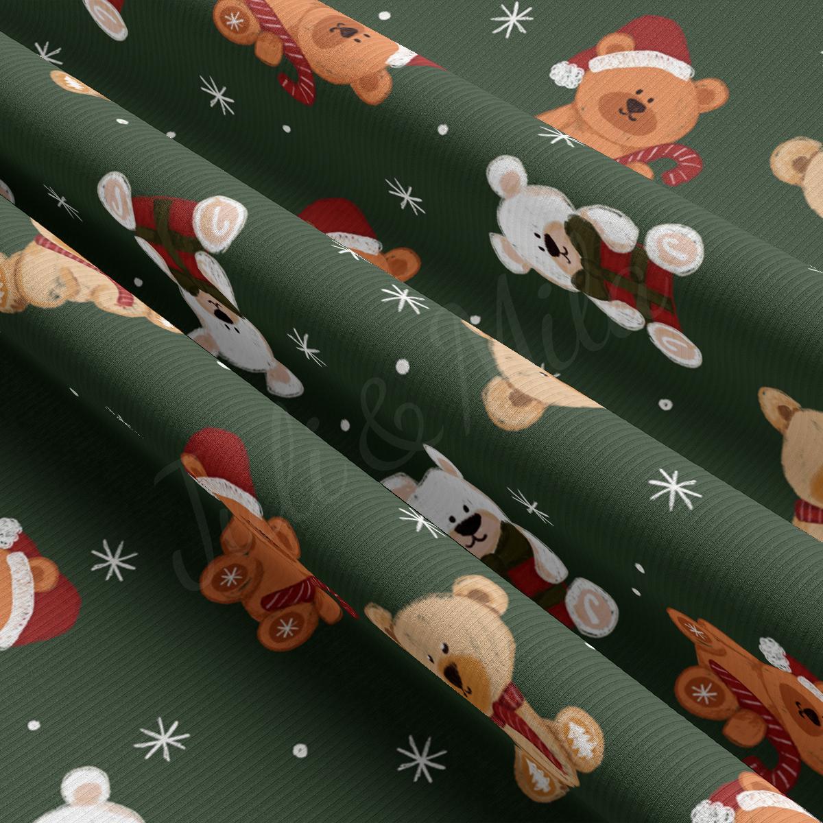 a green christmas wrapping with teddy bears and snowflakes