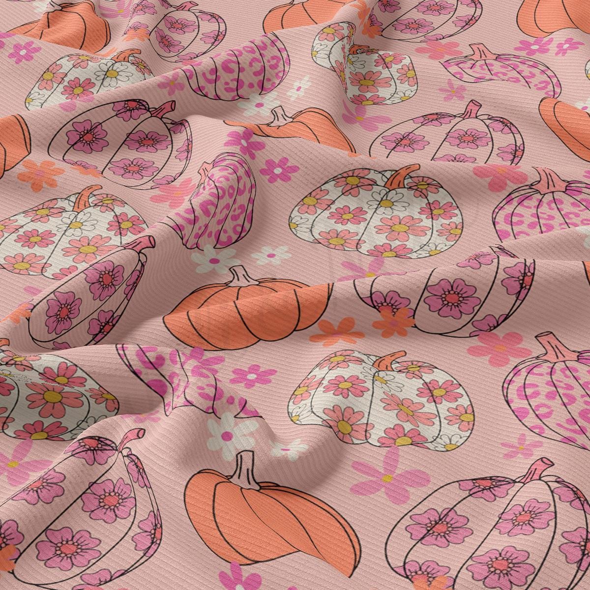 a pattern of pumpkins and flowers on a pink background