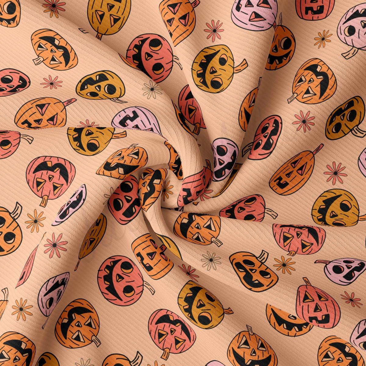 a close up of a pattern of pumpkins